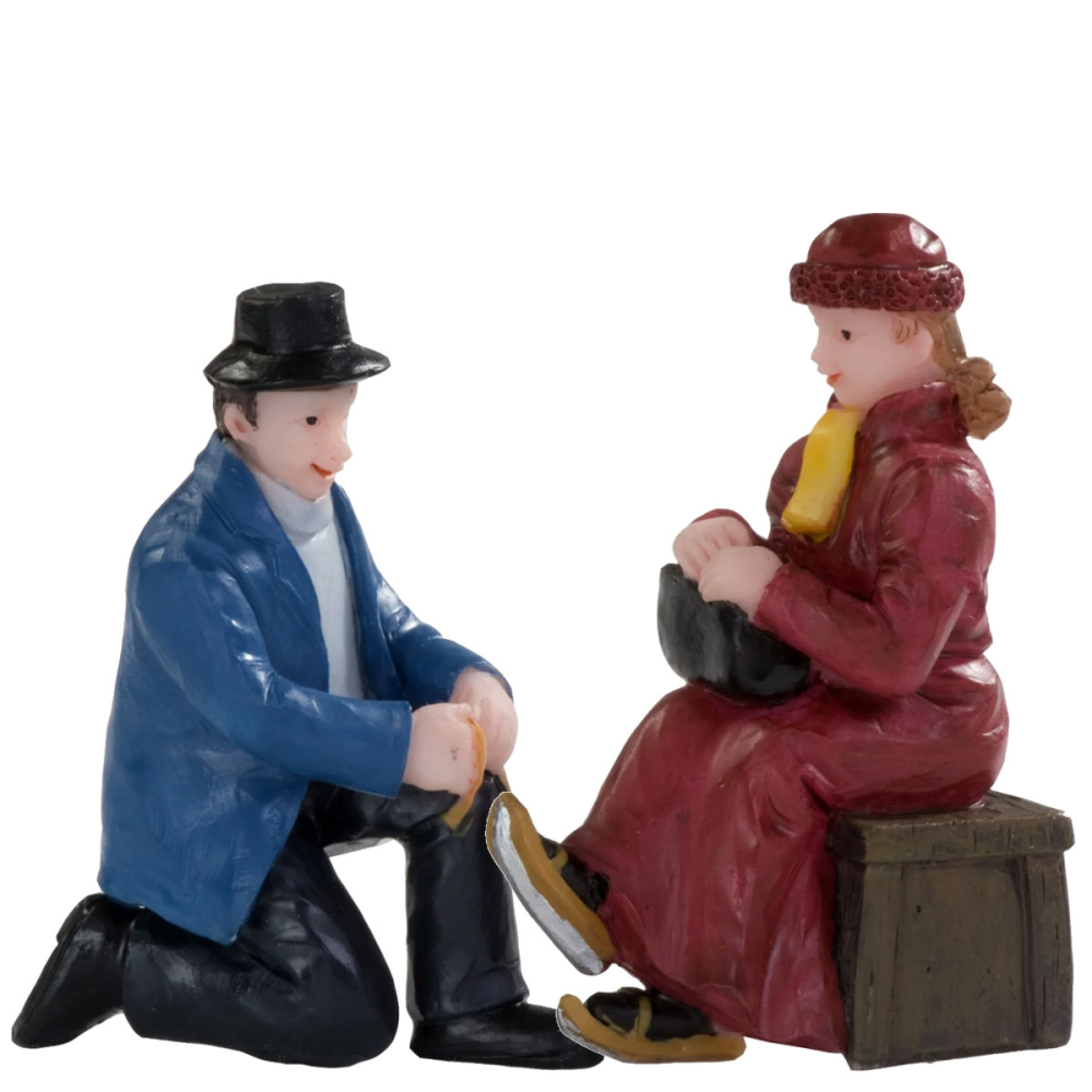 Dickensville - Man Bindt Schaatsen Onder - Set van 2 - - Polyresin -
